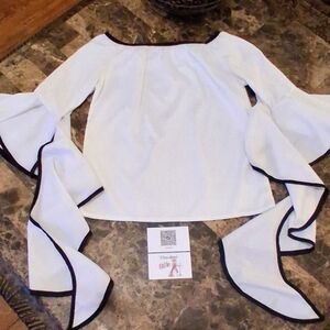 Elegant White Off-Shoulder Top with Black Trim